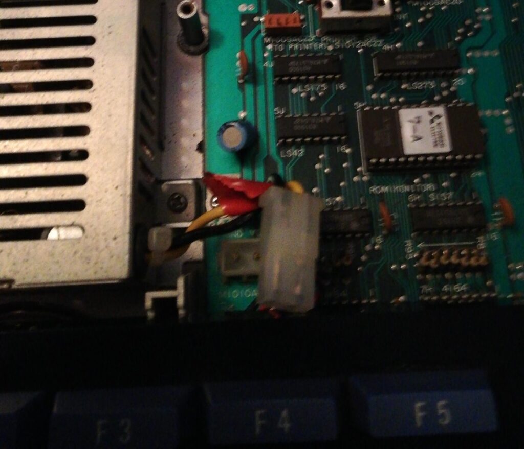 It definitely helps to remember to plug the power supply back into the main board if youi want the MZ-700 to work.