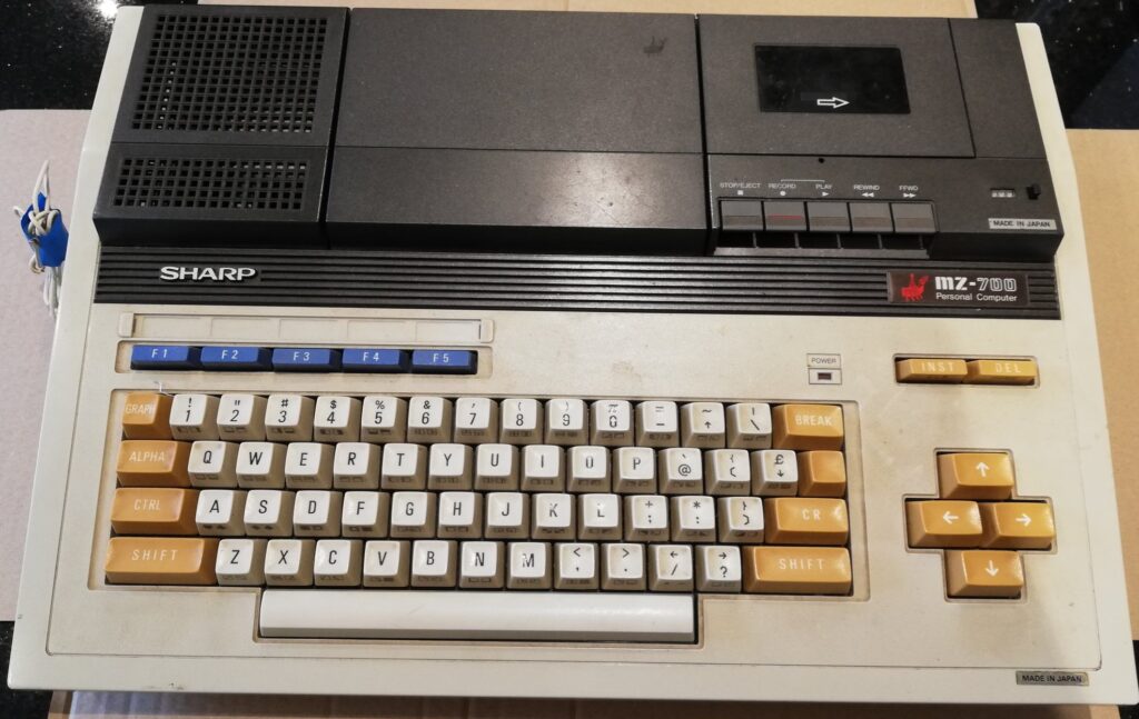 MZ-700 before restoration starts. The keyboard is sticky mess.