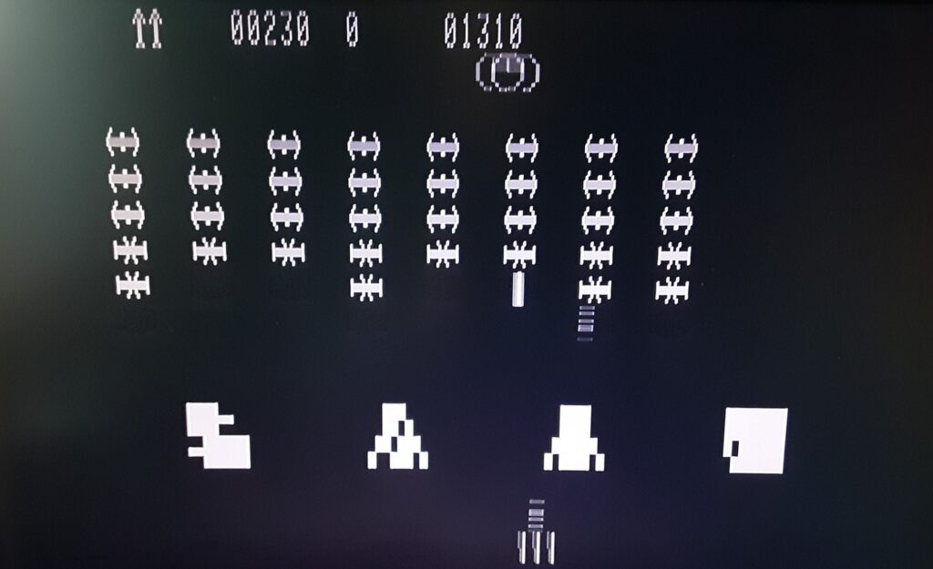 A space invaders game being played on the UK101