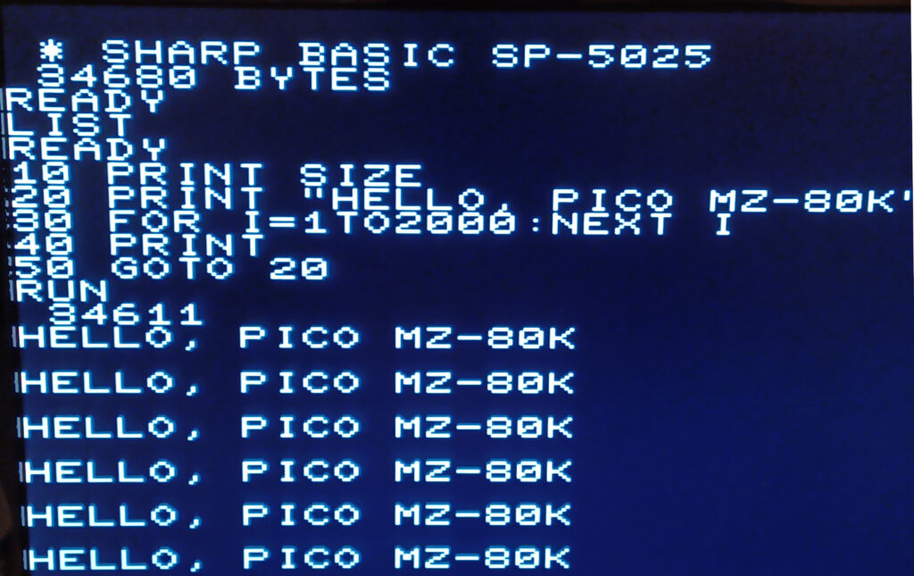 The Sharp MZ-80K pico emulator, running a short BASIC program to output the available free memory (34611 bytes) and output the phrase "HELLO, PICO MZ-80K" repeatedly.